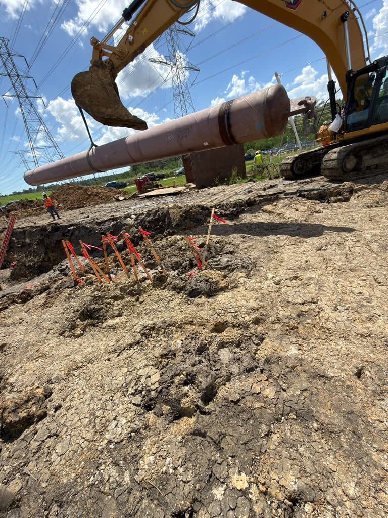 Steel casing rigged on an excavator